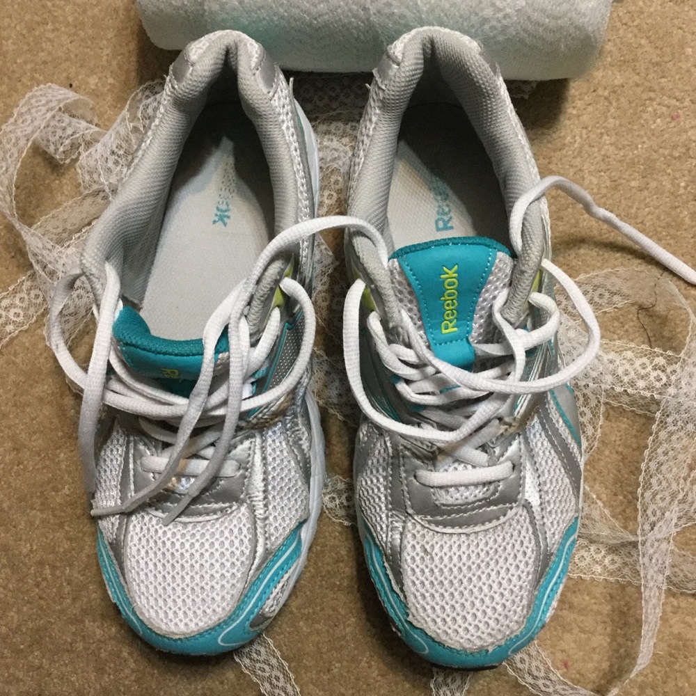 Reebok turquoise and white running shoes by